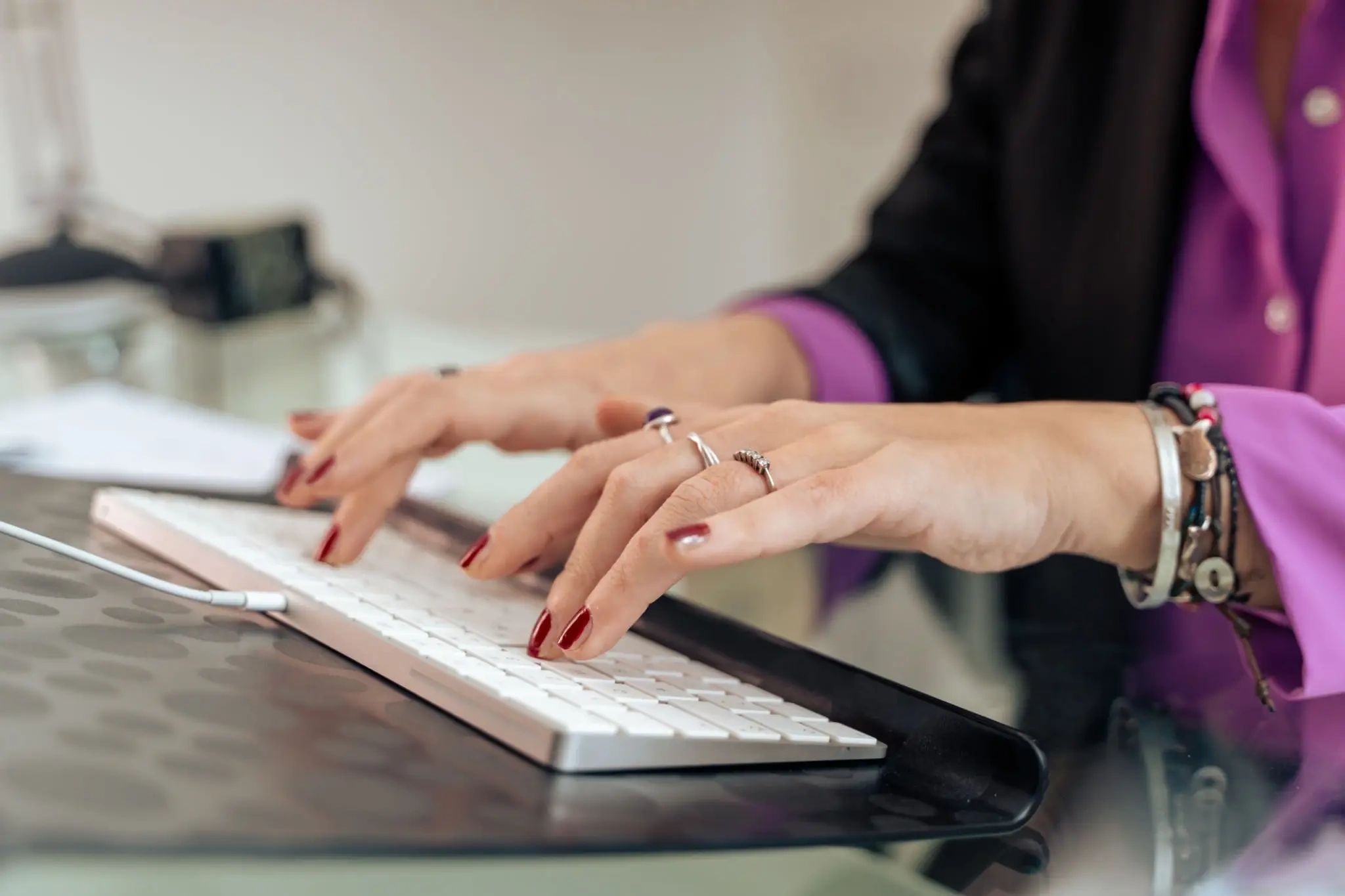 Writer at work on keyboard